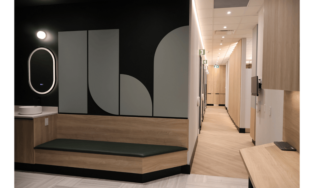 Patient seating area with modern wall design at Smilehaus Newmarket dental office