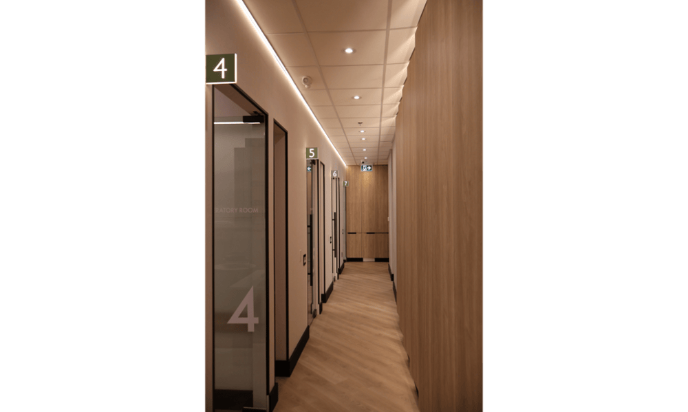 Corridor leading to treatment rooms at Smilehaus Newmarket dental clinic